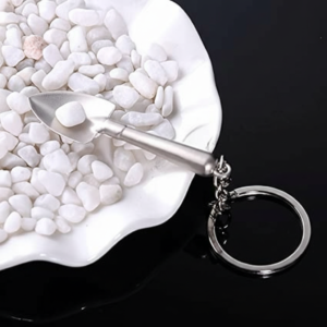 Whisk_ef22812411d87c6809346261bd319c9bdr Mini Shovel Metal Keychain